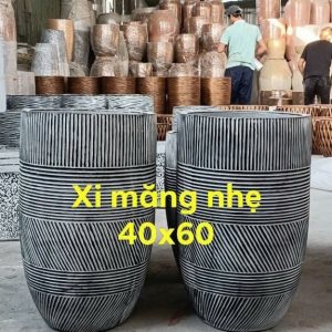 chậu xi măng nhẹ trồng cây